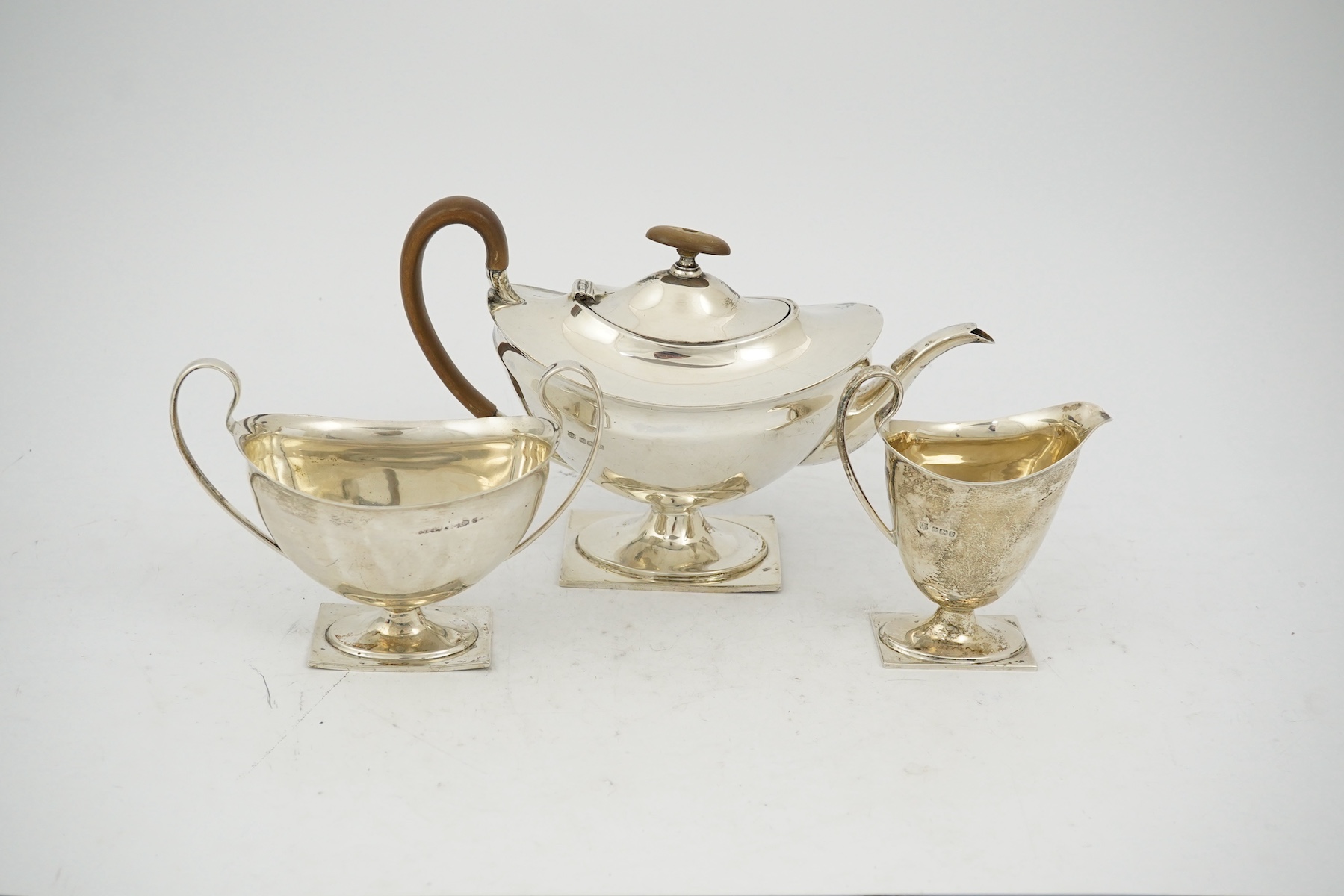 A George V silver three piece tea set by Fenton Brothers Ltd